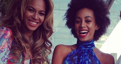 Beyonce and Solange smiling before Grammy Awards