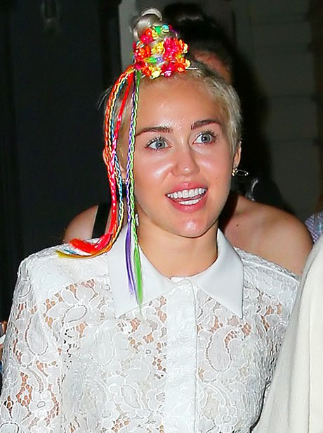 VERY fetching Ms. Cyrus! Miley shows off a new rainbow-coloured ...